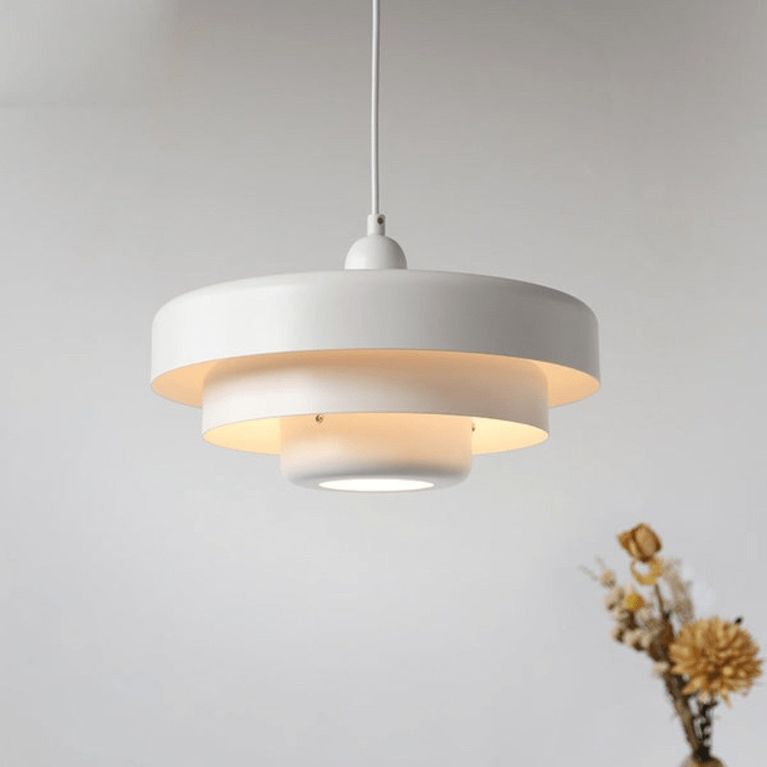 Three-tier pendant light with soft pastel shades over a table - product photo 5