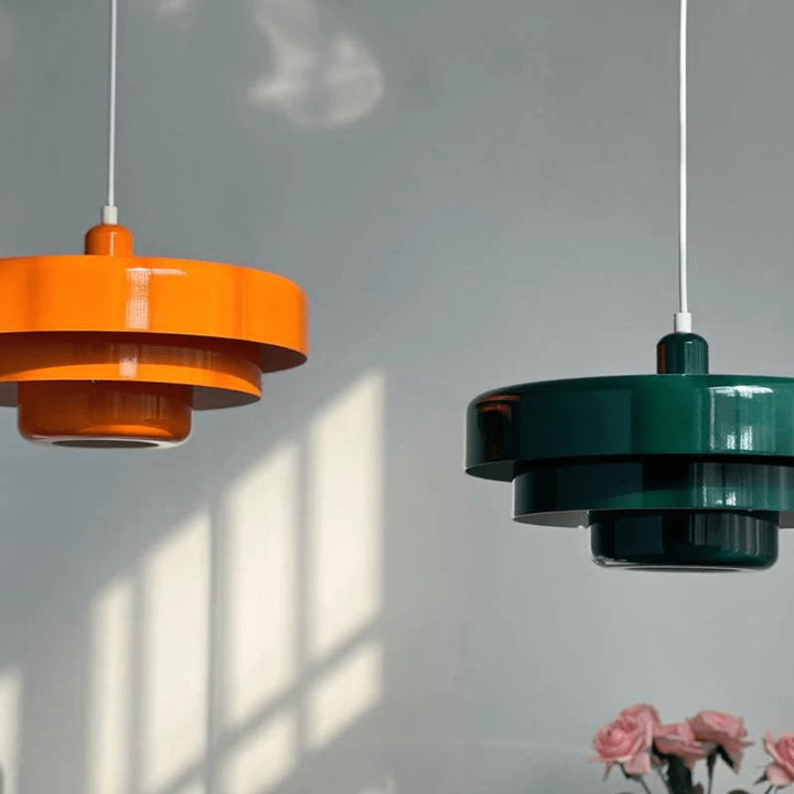 Three-tier pendant light with soft pastel shades over a table - product photo 6