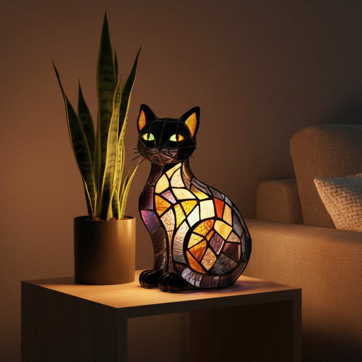 Tiffany-style stained glass cat table lamp glowing warm amber and green - product photo 2
