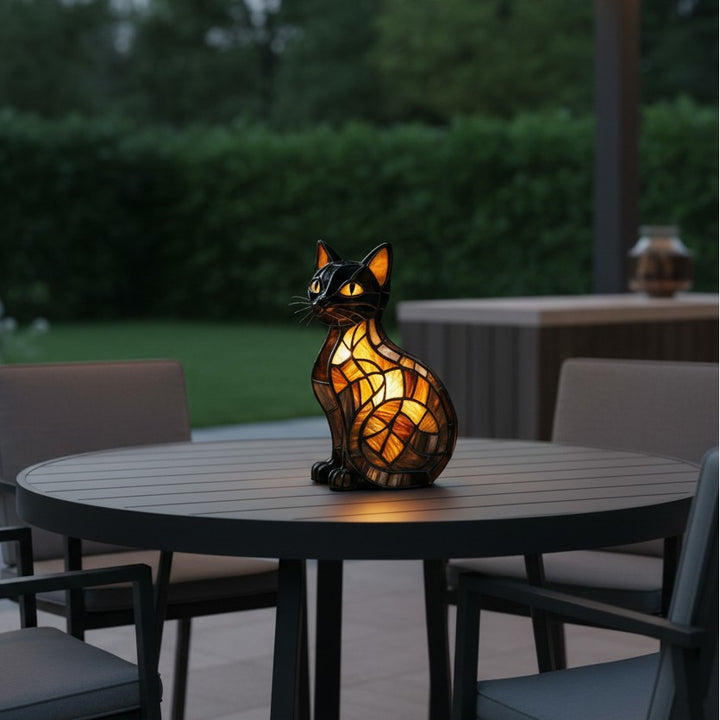 Tiffany-style stained glass cat table lamp glowing warm amber and green - product photo 6