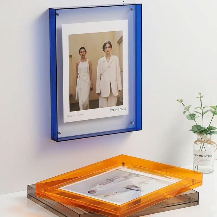 Transparent colored acrylic photo frame holding a photo - product photo 2