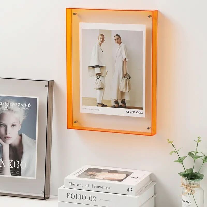 Transparent colored acrylic photo frame holding a photo - product photo 5
