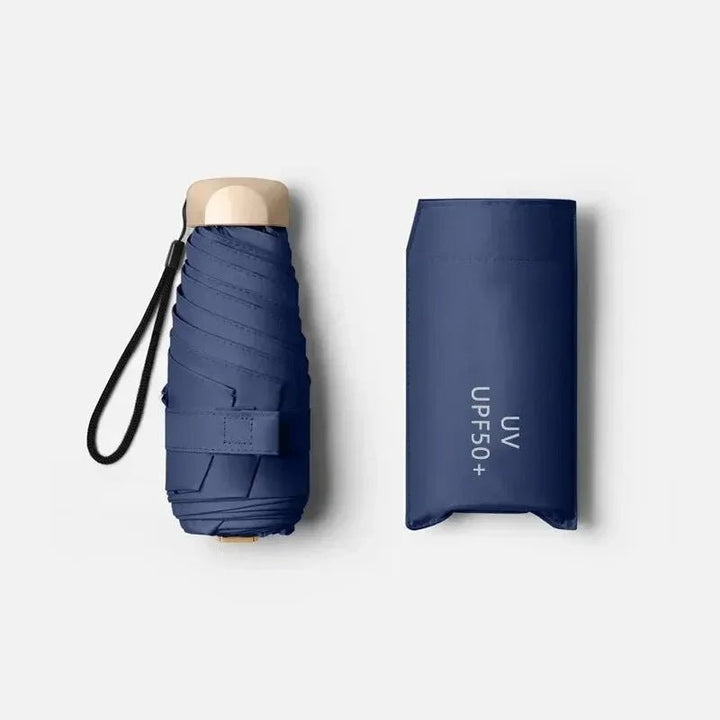 Ultra-compact folding umbrella beside its storage sleeve - product photo 7