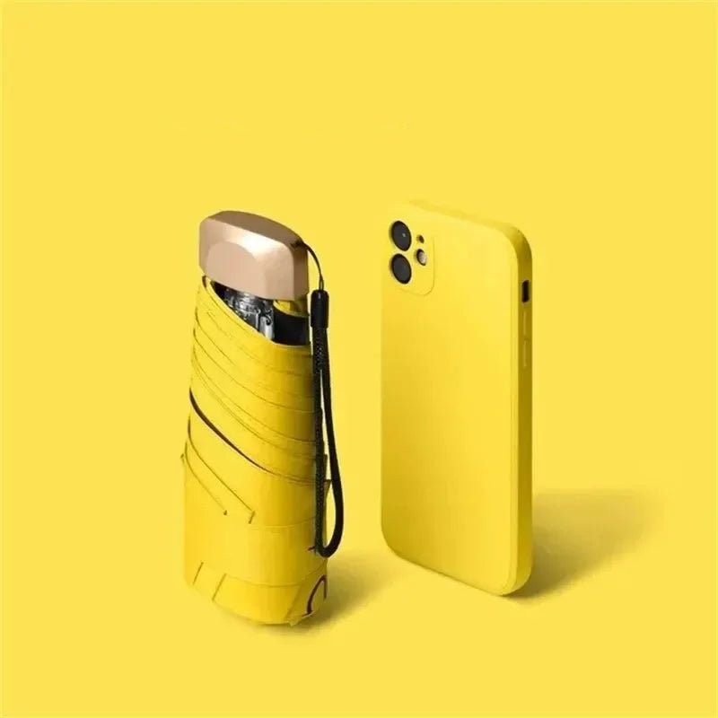Ultra-compact folding umbrella beside its storage sleeve - product photo 8