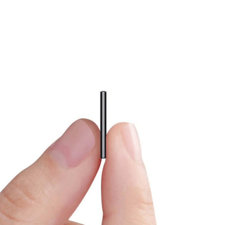 Ultra-light voice-activated audio recorder held in a hand - product photo 1