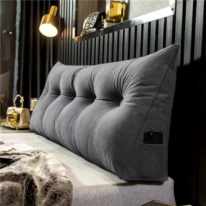 Upholstered wall cushion headboard behind a bed - product photo 11