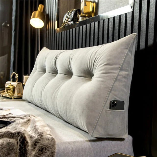 Upholstered wall cushion headboard behind a bed - product photo 2