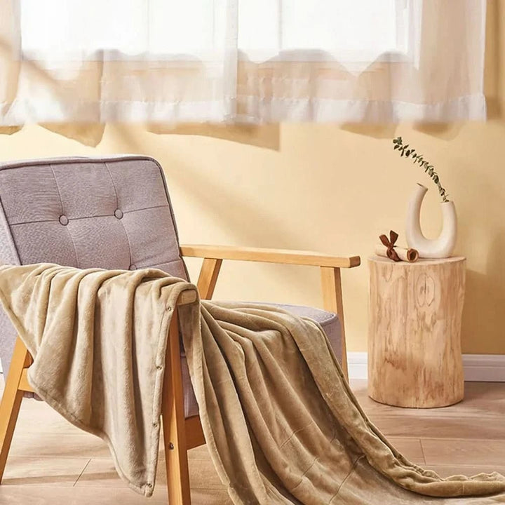 USB heated blanket draped over a lap - product photo 3