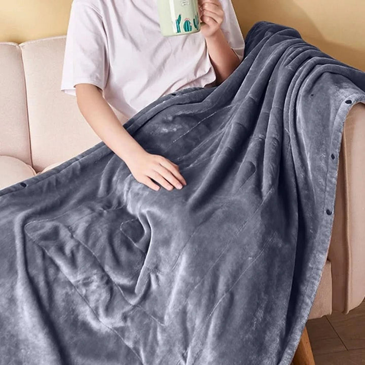 USB heated blanket draped over a lap - product photo 4
