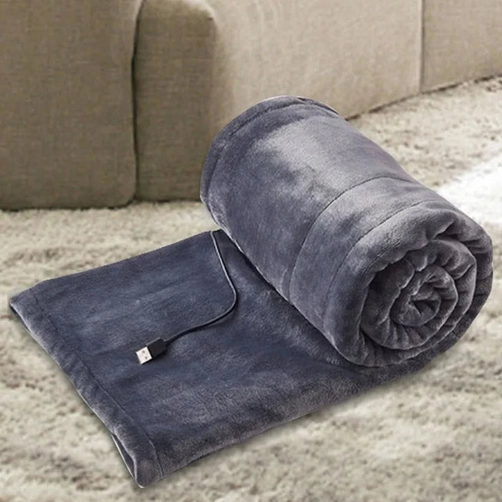 USB heated blanket draped over a lap - product photo 6