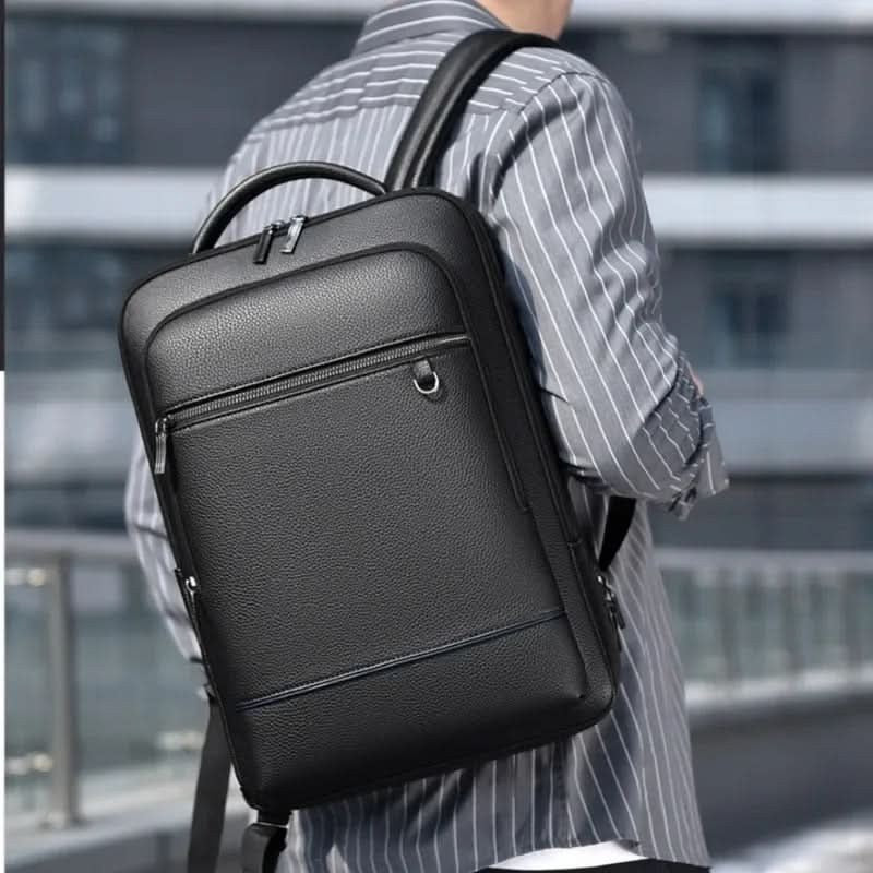 Vegan leather laptop backpack with a USB charging port - product photo 2