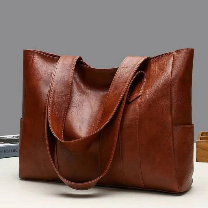 Vintage-style vegan leather shoulder bag with a zip closure - product photo 4