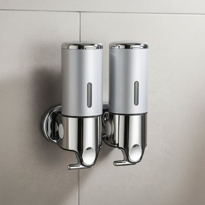 Wall-mounted stainless steel soap dispenser above a basin - product photo 10
