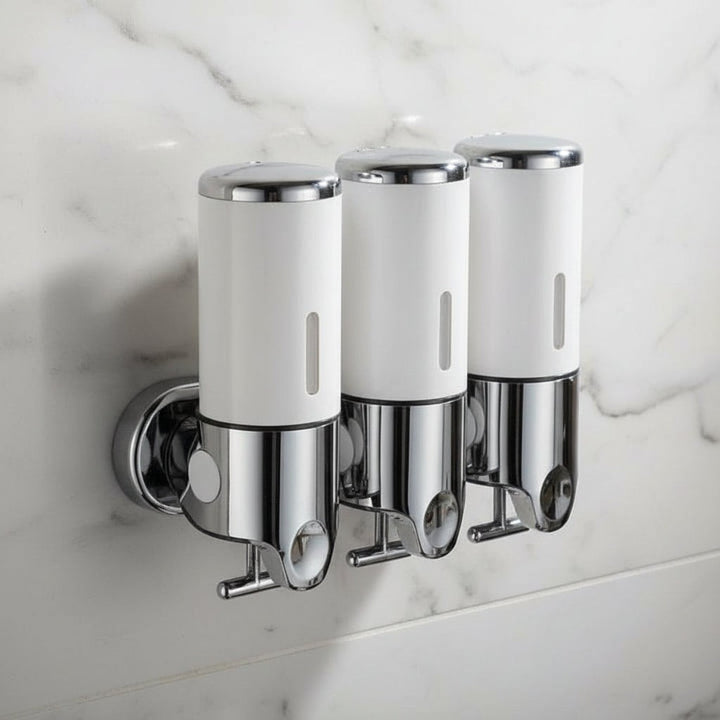 Wall-mounted stainless steel soap dispenser above a basin - product photo 13