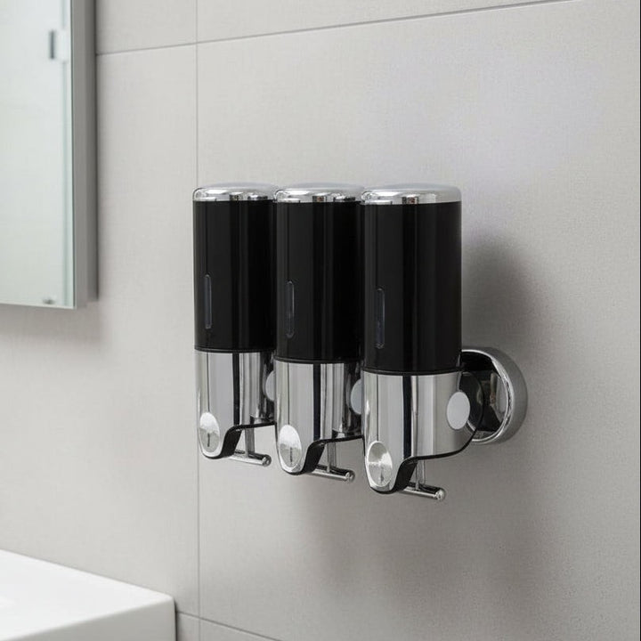 Wall-mounted stainless steel soap dispenser above a basin - product photo 16