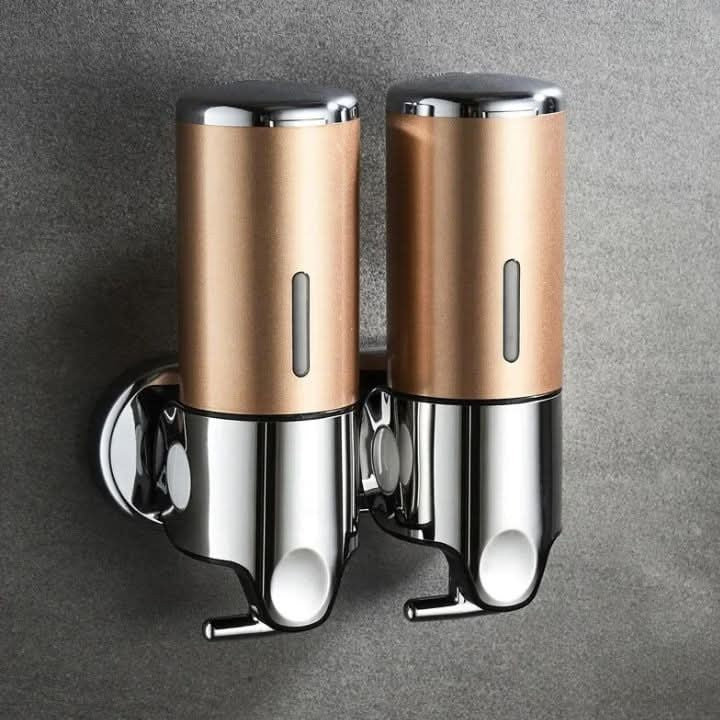 Wall-mounted stainless steel soap dispenser above a basin - product photo 20