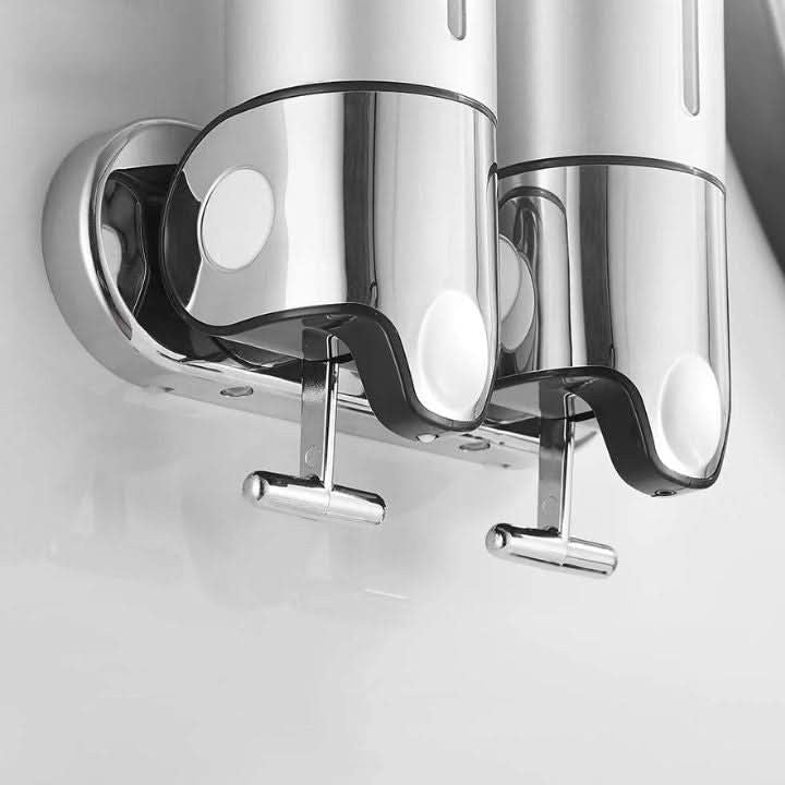 Wall-mounted stainless steel soap dispenser above a basin - product photo 7