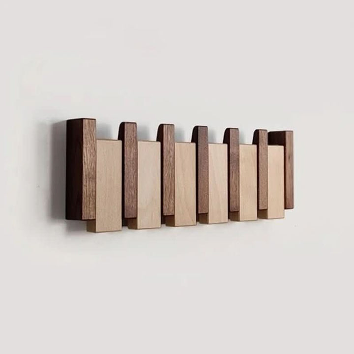 Handmade walnut wall coat rack with folding hooks - product photo 1