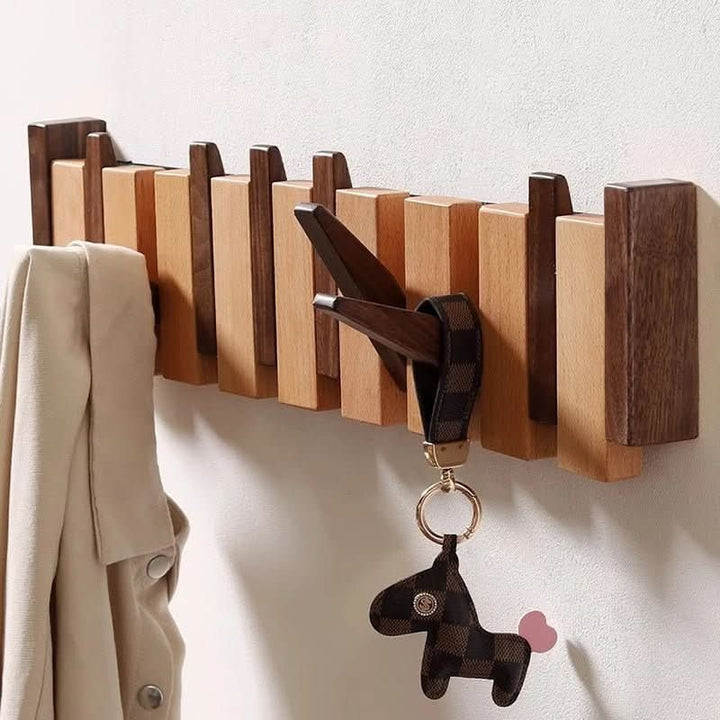 Handmade walnut wall coat rack with folding hooks - product photo 2
