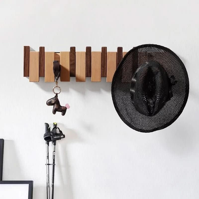 Handmade walnut wall coat rack with folding hooks - product photo 3