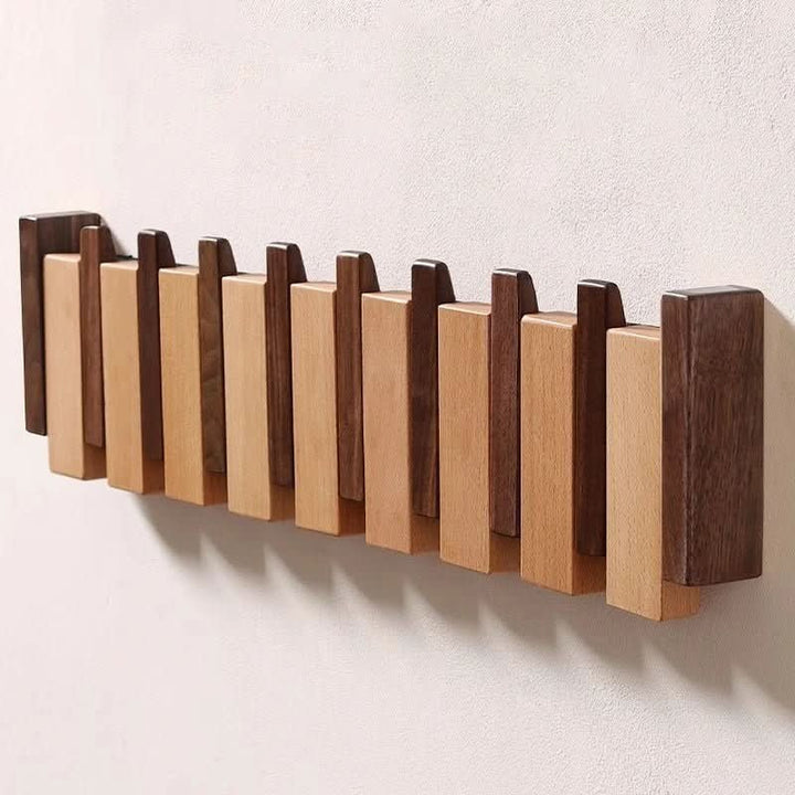Handmade walnut wall coat rack with folding hooks - product photo 4