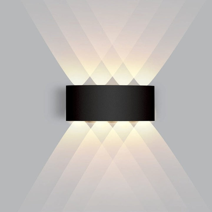 Weatherproof LED outdoor wall light casting an even glow on a wall - product photo 15