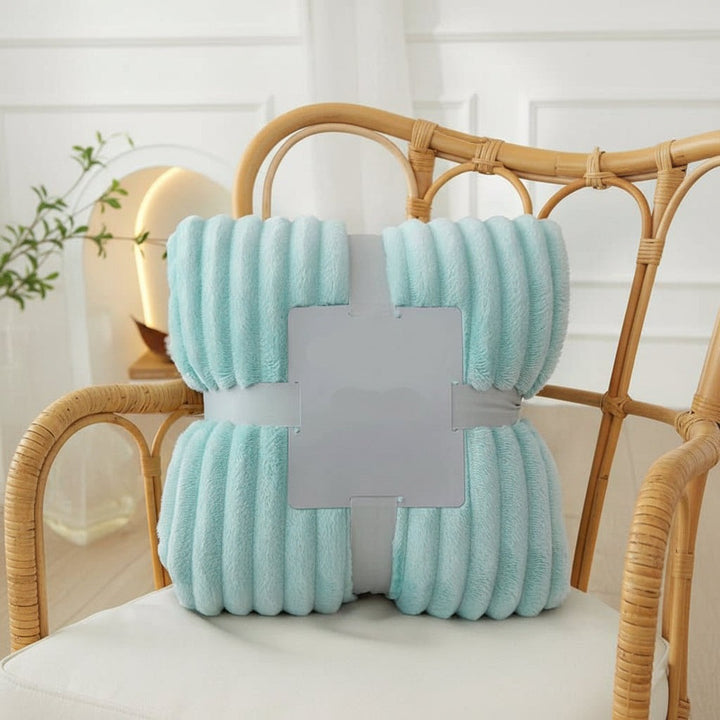 Wide striped flannel fleece blanket on a sofa - product photo 9