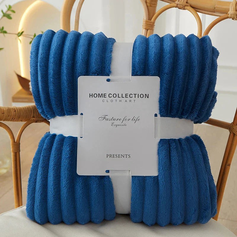 Wide-stripe flannel fleece blanket on a sofa - product photo 10