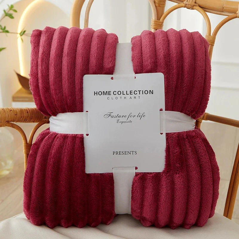 Wide-stripe flannel fleece blanket on a sofa - product photo 12