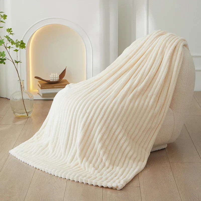 Wide-stripe flannel fleece blanket on a sofa - product photo 14