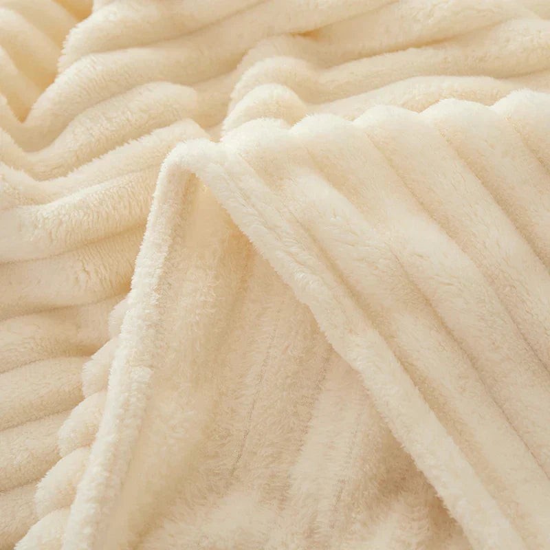 Wide-stripe flannel fleece blanket on a sofa - product photo 16
