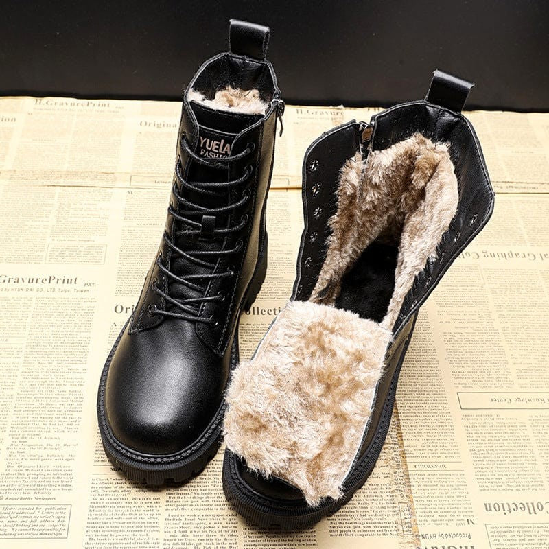 Women's fur-lined black winter boots with a side zip - product photo 1