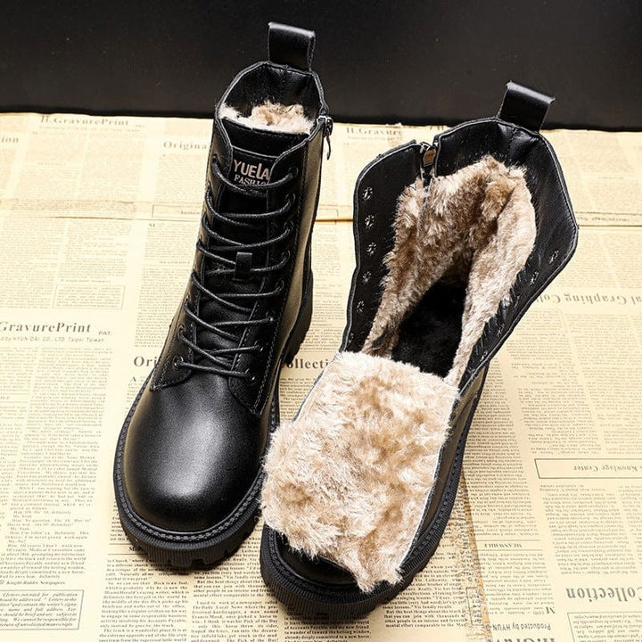 Women's fur-lined black winter boots with a side zip - product photo 1