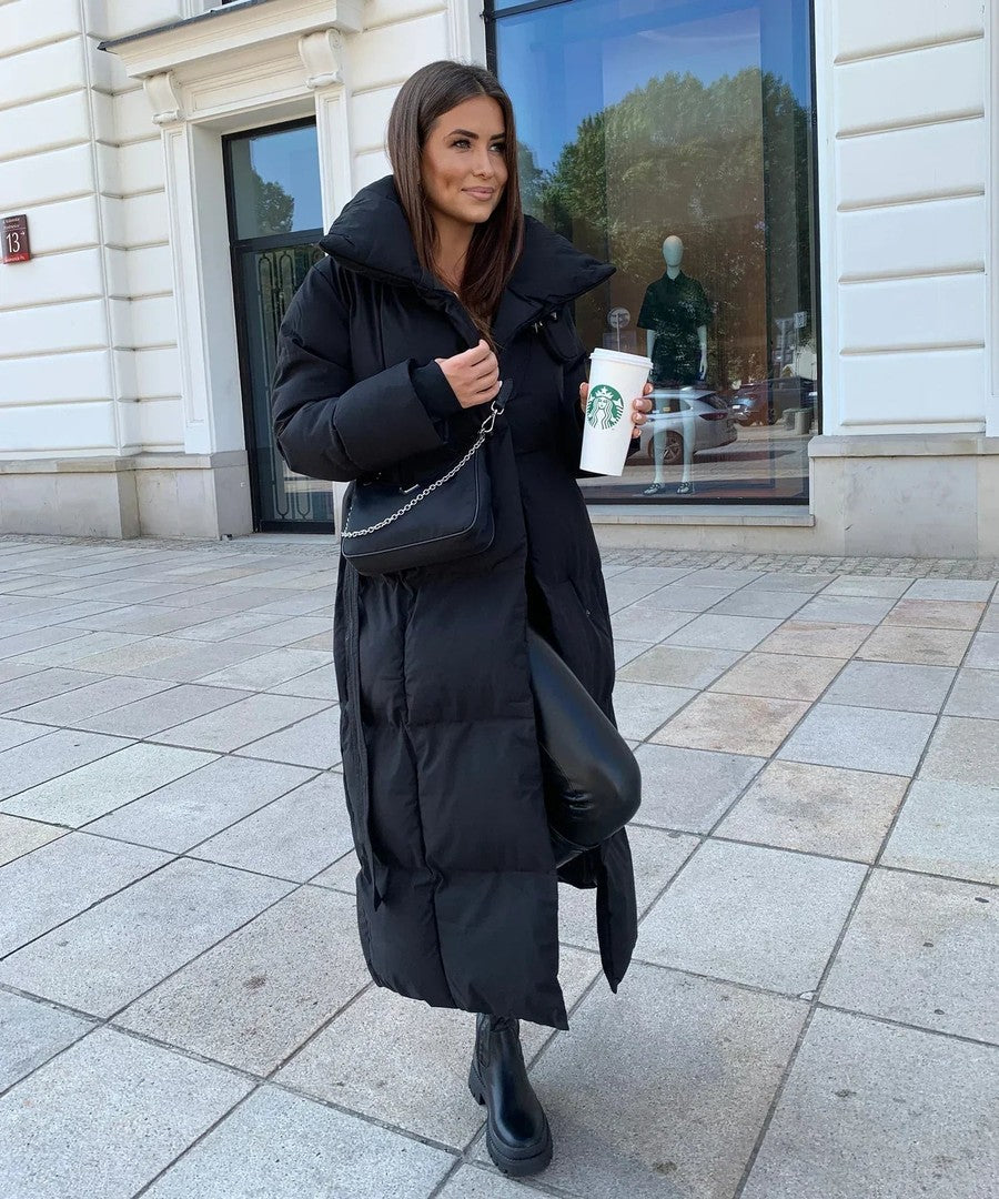 Women's long winter coat with an adjustable waist belt - product photo 1
