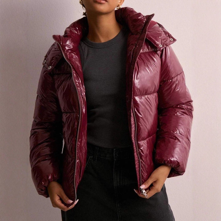 Women's quilted jacket with an adjustable hood - product photo 1
