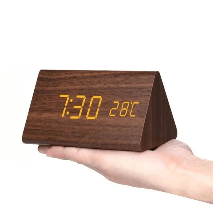 Wooden LED desk clock with a glowing digital time display - product photo 12