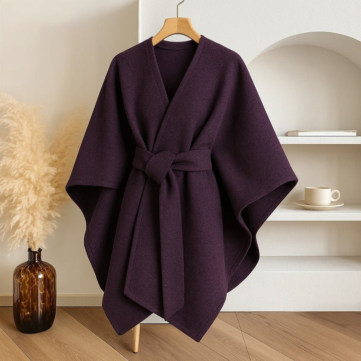 Wool-blend poncho wrap draped over the shoulders - product photo 10