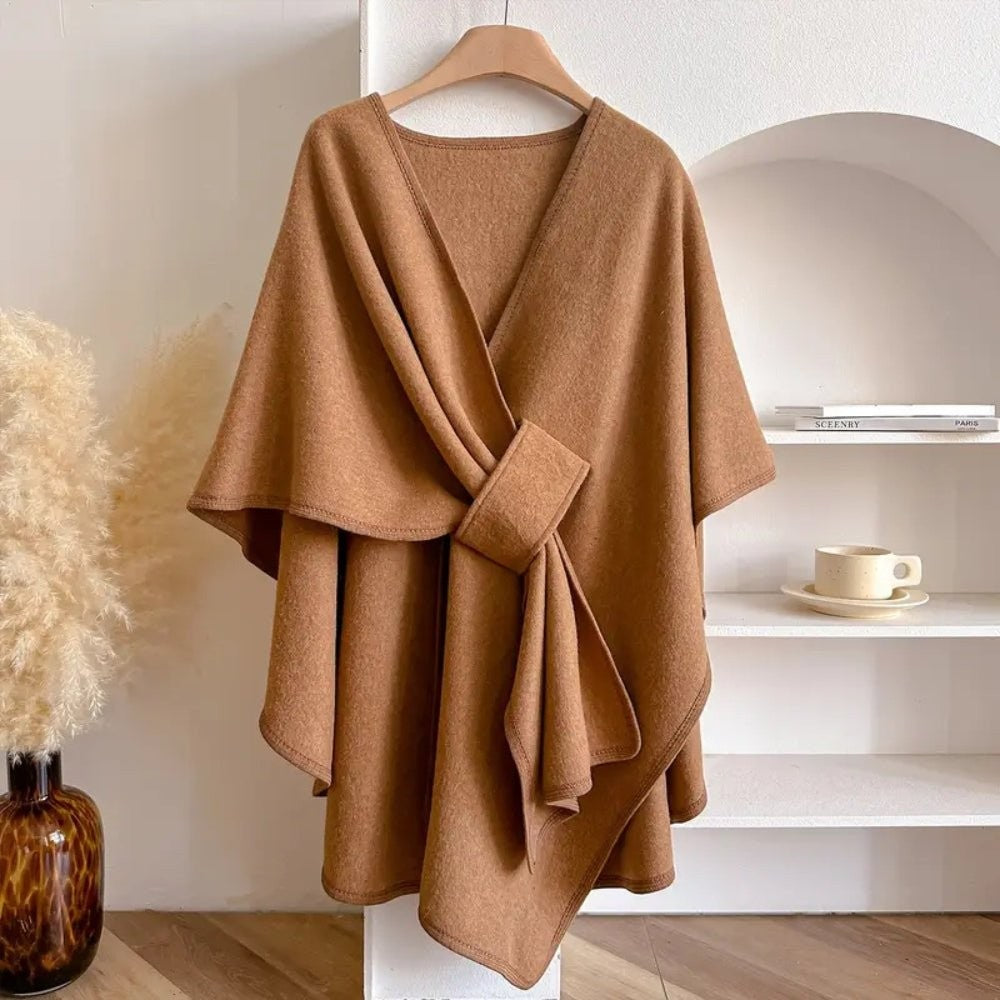 Wool-blend poncho wrap draped over the shoulders - product photo 3