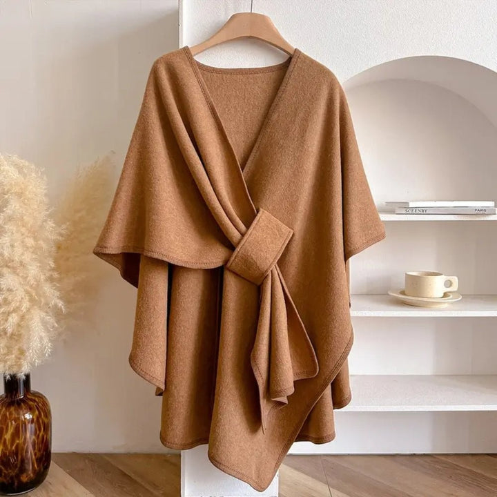 Wool-blend poncho wrap draped over the shoulders - product photo 3