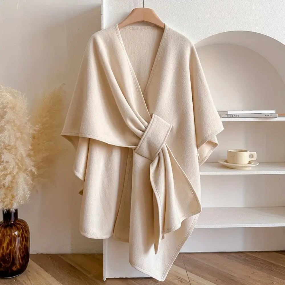 Wool-blend poncho wrap draped over the shoulders - product photo 5