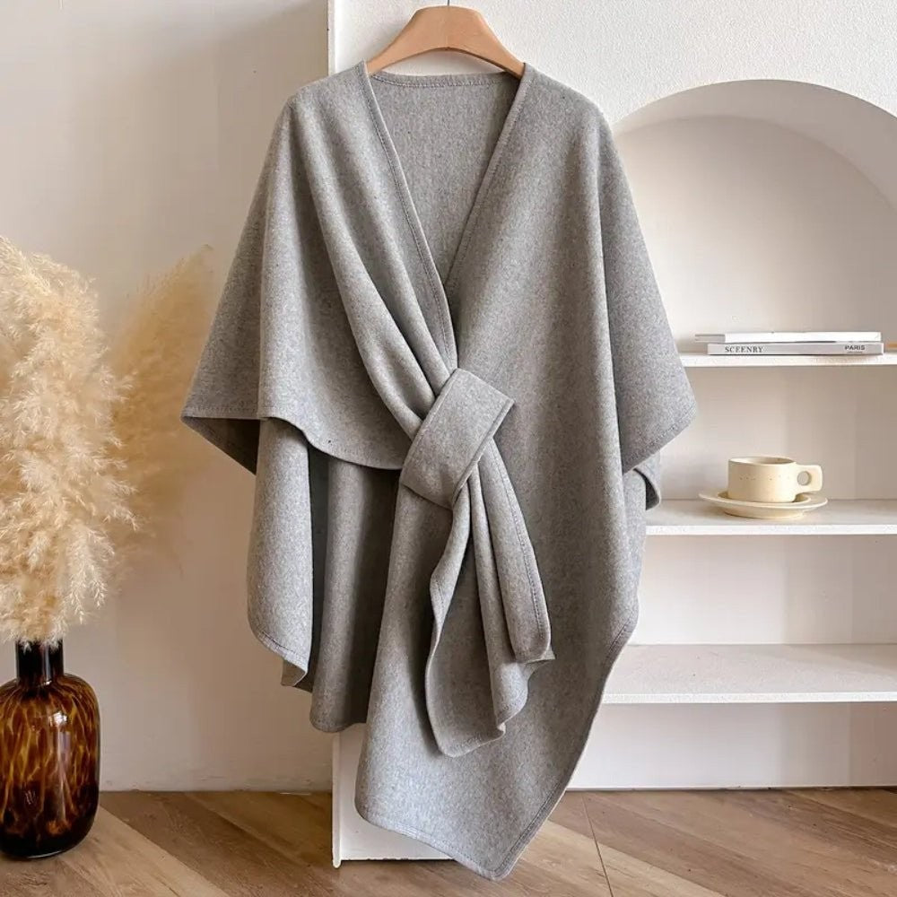 Wool-blend poncho wrap draped over the shoulders - product photo 8