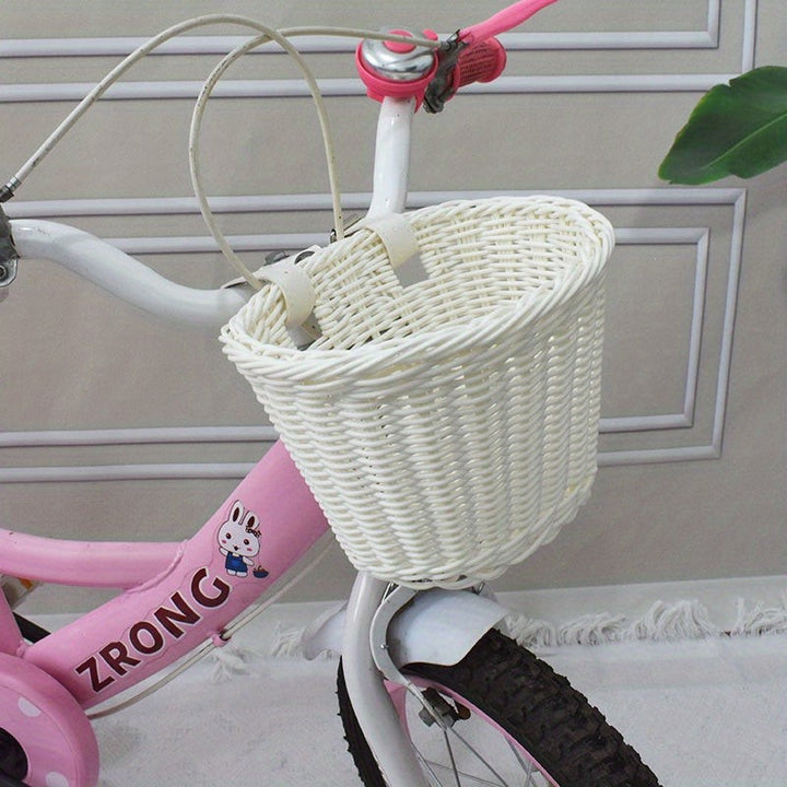 Woven bicycle basket mounted on a child's bike - product photo 2