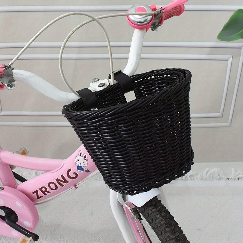 Woven bicycle basket mounted on a child's bike - product photo 3