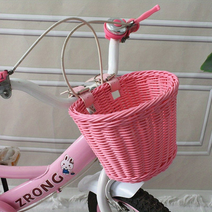 Woven bicycle basket mounted on a child's bike - product photo 4