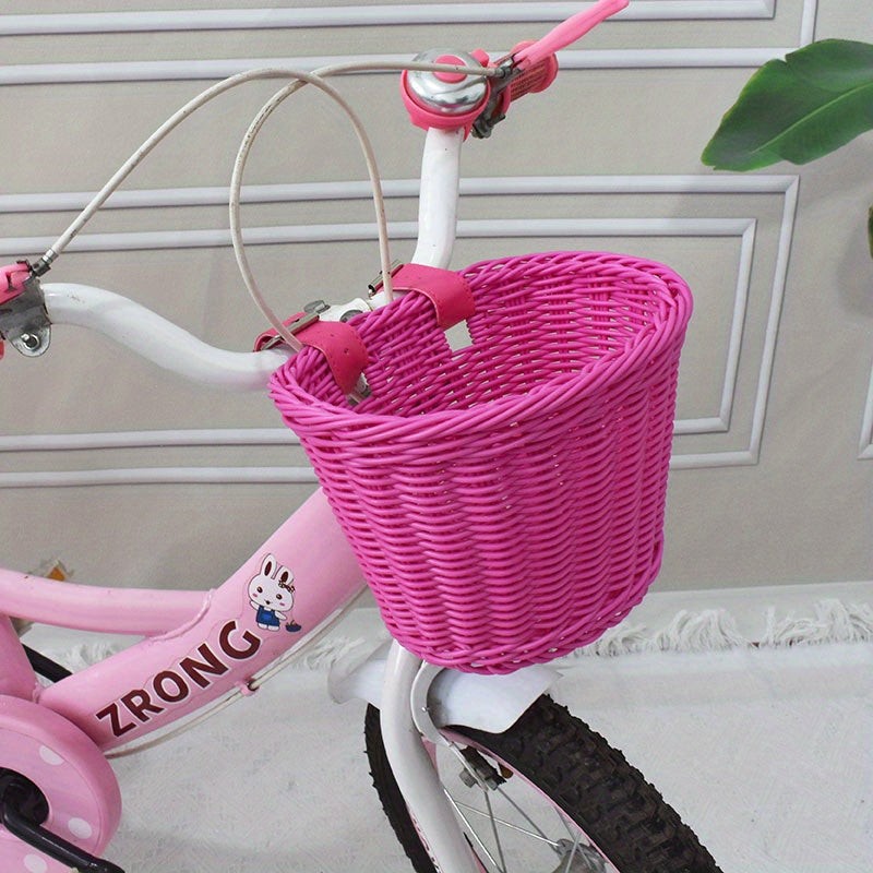 Woven bicycle basket mounted on a child's bike - product photo 6
