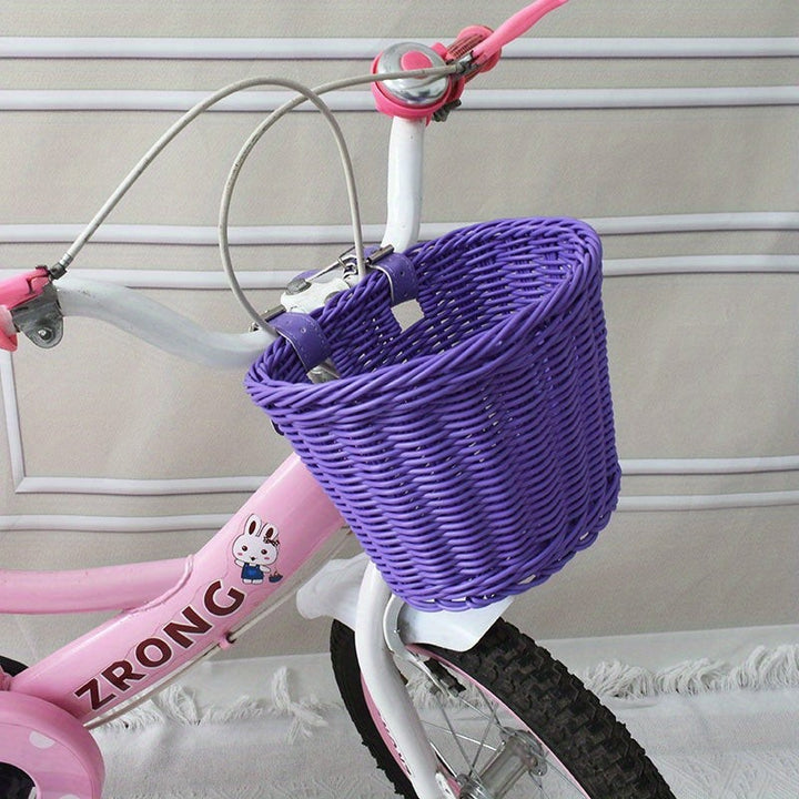 Woven bicycle basket mounted on a child's bike - product photo 7