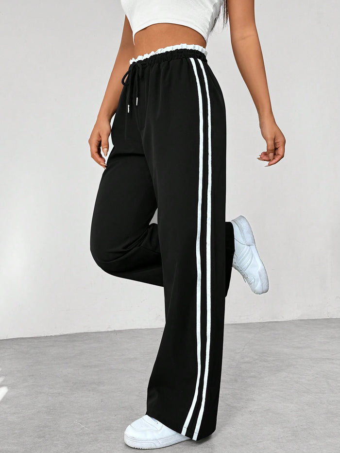 Madison | Women’s Sporty High-Waisted Jogger Pants in Black with White Stripes